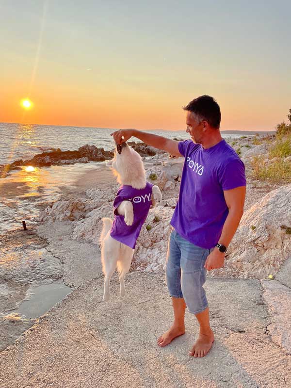 Buco the dog with a coworker